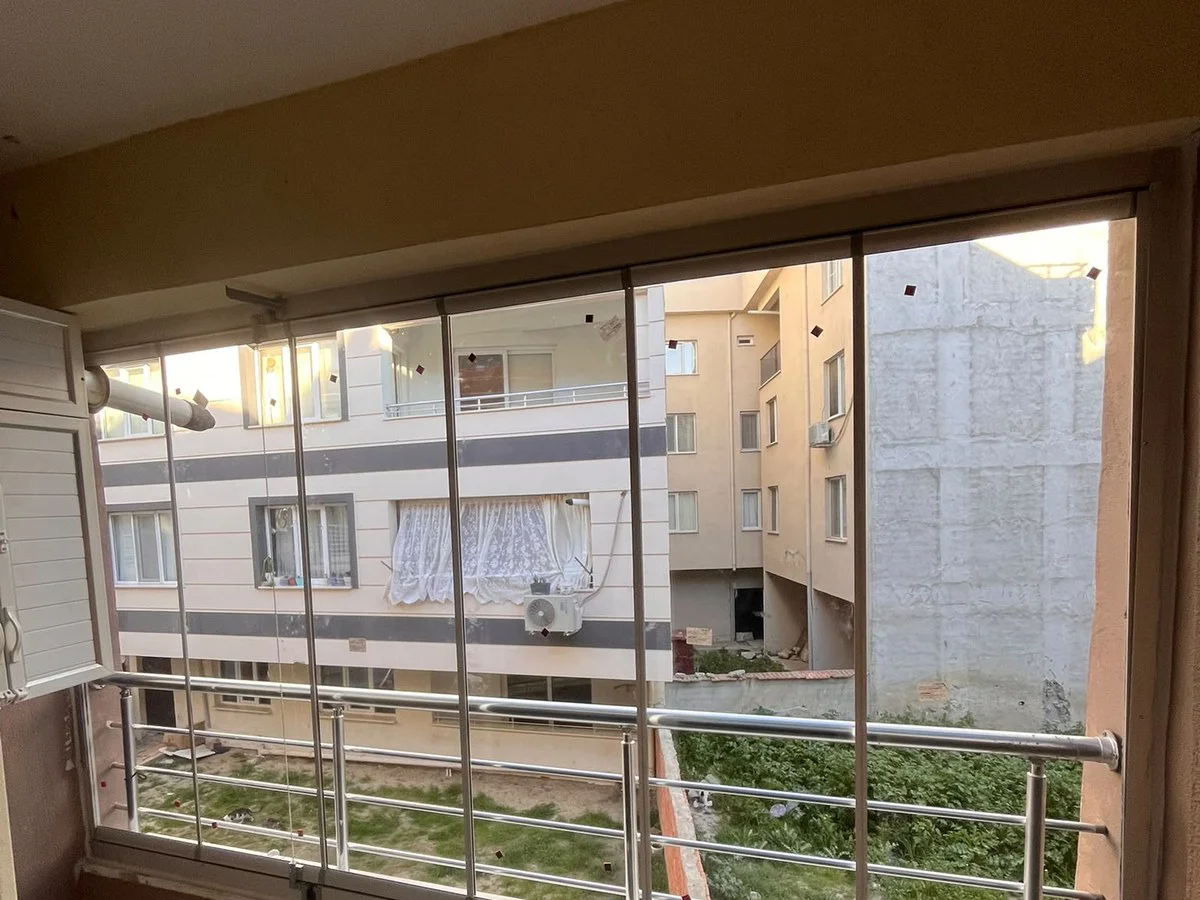 Saruhanlı cam balkon uygulaması – balkon cam kapatma – Ünal Yapı